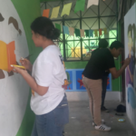 Aprende ACASAYC 22 Pintando murales en colegio